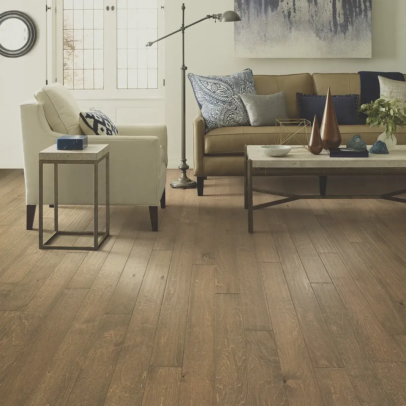 Light brown hardwood in a living room featuring | FloorCo.