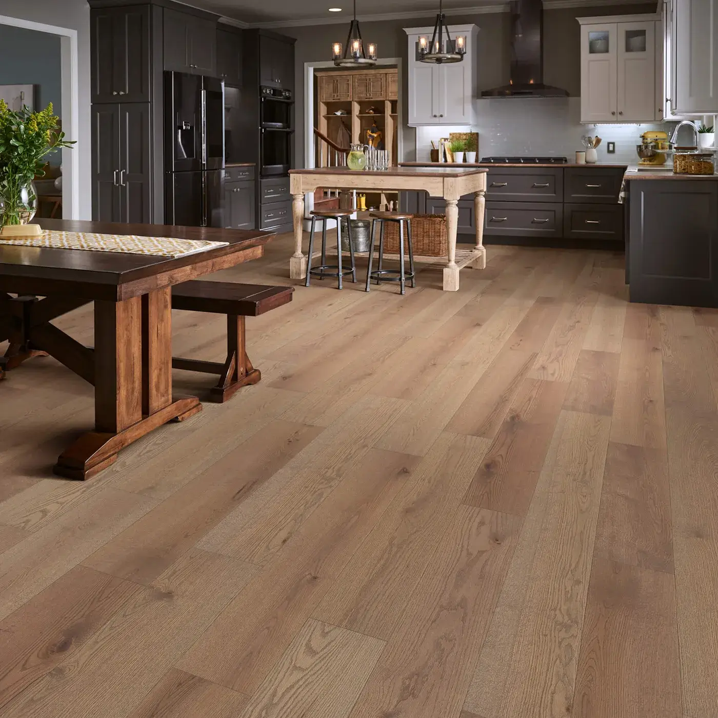 Shaw Floors hardwood in a light brown color in a kitchen | FloorCo.