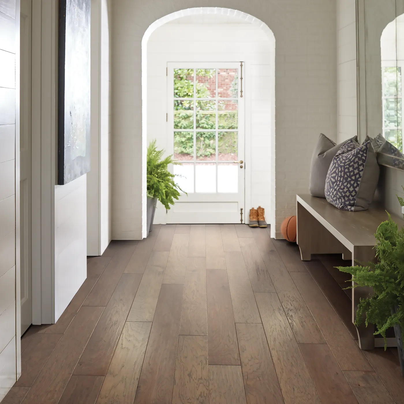 Medium toned hardwood flooring in hallway | FloorCo.