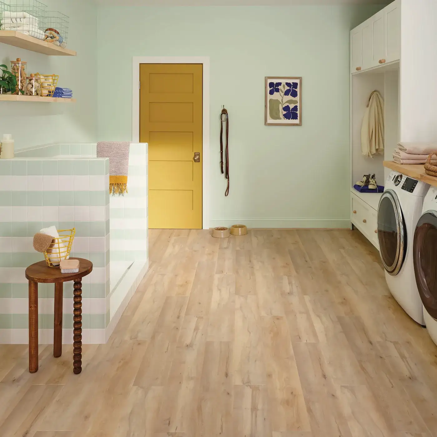 COREtec Luxury Vinyl in a light blonde wood color in a laundry room | FloorCo.
