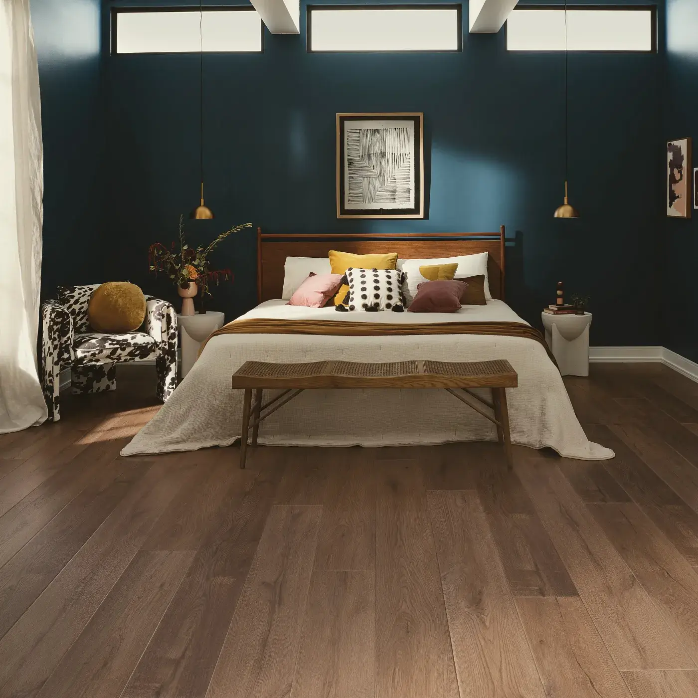 COREtec Luxury Vinyl in a medium brown wood tone in a bedroom | FloorCo.