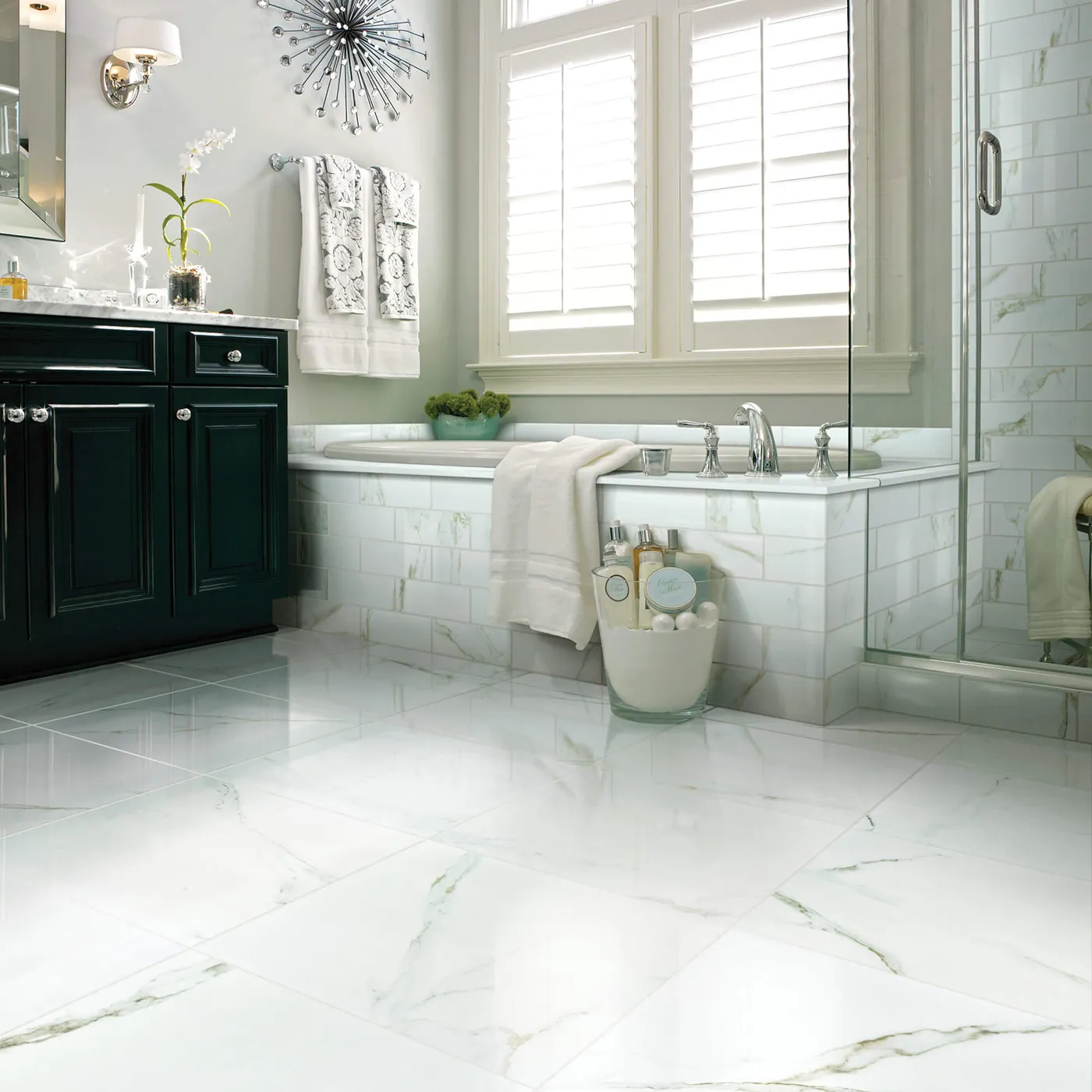 Shaw Floors Calacatta Oro polished white marble-look tile in a luxurious bathroom | FloorCo.