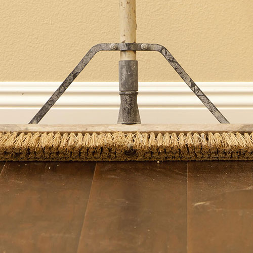 Broom on hardwood floors | Floorco Premium